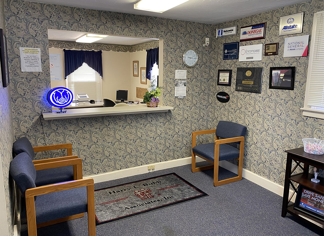 Hanover, PA - Closeup View of the Front Reception Area with Carrier Logos on the Walls and Seats in the Bubb Insurance Office in Hanover Pennsylvania